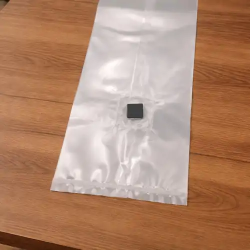 Grey self-healing injection port on a sterile spawn bag, allowing for contamination-free inoculation with liquid culture syringes.